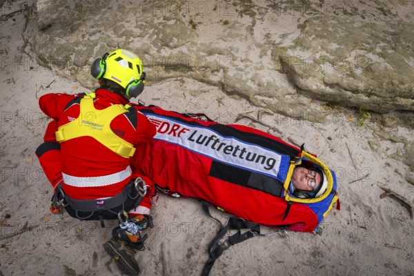 Winch rescue training of the rescue helicopter, Christoph 62, on the occasion of the 50th anniversary of the DRF Luftrettung. The rescue of casualties in the Elbe Sandstone Mountains will be practised