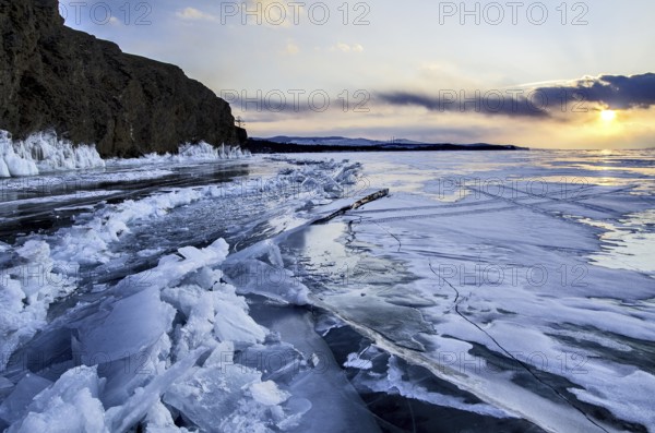 Sunset on ice, Lake Baikal, Olkhon Island, Pribaikalsky National Park, Irkutsk Province, Siberia, Russia, Europe