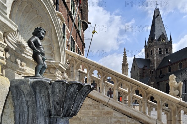 Little Man Pee, Manneken Pis and St Bartholomew's Church in Geraardsbergen, Grammont, Belgium, Europe