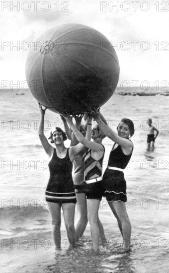 Bathing group on the beach, four woman with a big ball, funny, laughing, summer holidays, holiday, joie de vivre, about 1930s, Baltic Sea, Rügen, Mecklenburg-Western Pomerania, Germany, Europe