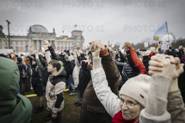 People hold hands at the large demonstration against the right in Berlin under the slogan We are the firewall . Recorded in Berlin, 03.02.2024