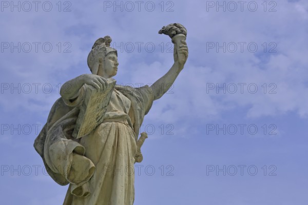 Sculpture Statue of Liberty at the Fontaine de la Fédération built in 1890, allegory, republic, French, arms, high, up, gesture, torch, book, plaque, carry, hold, detail, cut out, Liberty Square, Place de la liberte, Toulon, Var, Provence, France, Europe