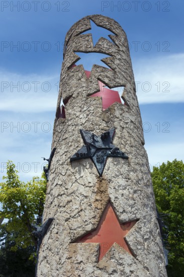 Column with punched-out stars and metal reliefs under a blue sky, National Column in front of the European Museum, Schengen, border triangle, Canton of Remich, Grand Duchy of Luxembourg