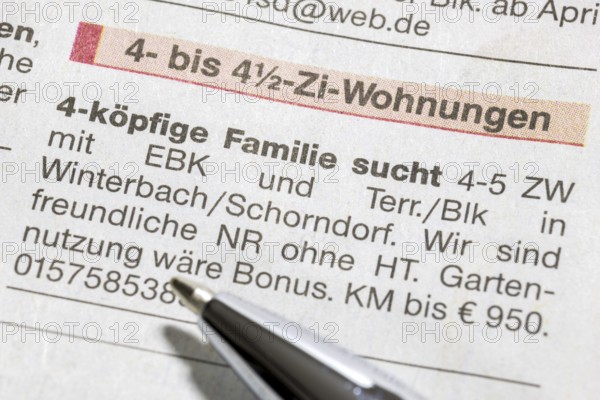 Symbolic image of housing shortage, housing advert and pen, family, search, Germany, Europe