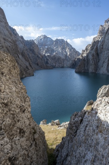 Mountain lake Kol Suu rocky steep mountains, Kol Suu Lake, Sary Beles Mountains, Naryn Province, Kyrgyzstan, Asia