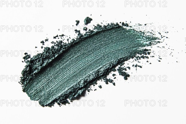 Dark green eyeshadow makeup sample swatch on white background. Generative AI, AI generated