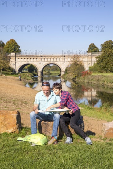 Hikers in the Steverauen Olfen, Alte Fahrt canal bridge, of the Dortmund-Ems Canal, a renaturalised floodplain landscape and a local recreation area in the north of Olfen, Hohe Mark Westmünsterland nature park Park, North Rhine-Westphalia, Germany, Europe