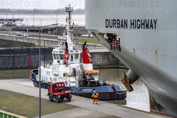 North lock in the overseas harbour of Bremerhaven, the vehicle transporter Durban Highway, under the flag of Panama, can load around 600 cars, leaves the harbour from the Bremerhaven car terminal, loaded with new cars, then heads for the Suez Canal, Bremen, Germany, Europe