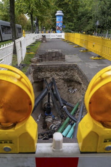 Construction site, excavation pit, work on supply lines, various types, electricity, water, gas, communication, in Düsseldorf North Rhine-Westphalia, Germany, Europe