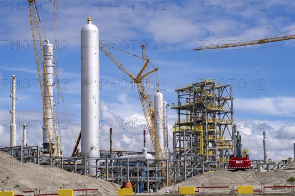 New building, construction site, of a bio-refinery of the Finnish oil company Neste, here, among other things, sustainable bio aviation fuels are to be produced, construction site in the harbour Maasvlakte 2, in Rotterdam, Netherlands