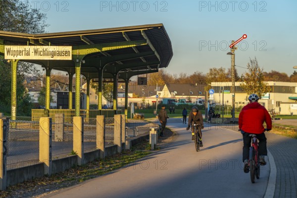 The Nordbahntrasse, a cycle path, footpath, on a former 22 KM long railway line, along the west-east axis of Wuppertal, on the northern slope, with many tunnels, viaducts and views of the city, old railway platform, Wuppertal, North Rhine-Westphalia, Germany, Europe