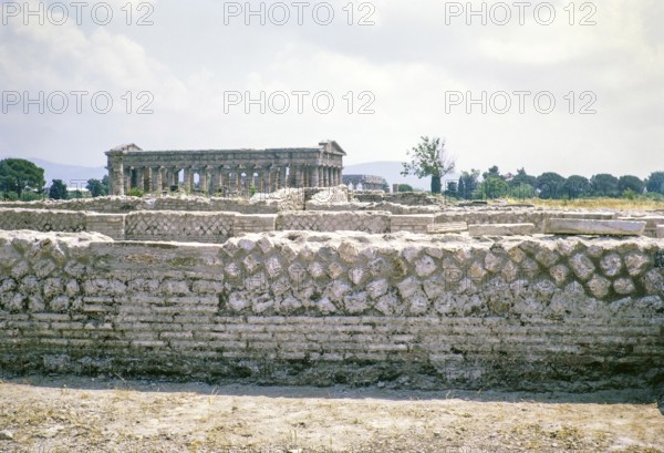 Excavations in foreground, Greek temples at Paestum archaeological park, Campania, Italy, Europe 1967 1967, Europe