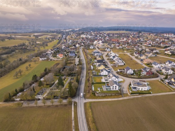 Rural street scene with neighbouring houses and fields in a suburban area, Schopfloch, Freudenstadt district, Germany, Europe