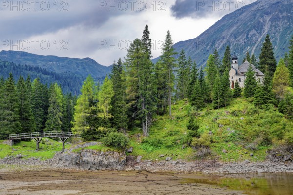 Lake chapel Maria am See, Obernberger See, mountain lake, landscape of the Stubai Alps, weather mood, Obernberg am Brenner, Tyrol, Austria, Europe