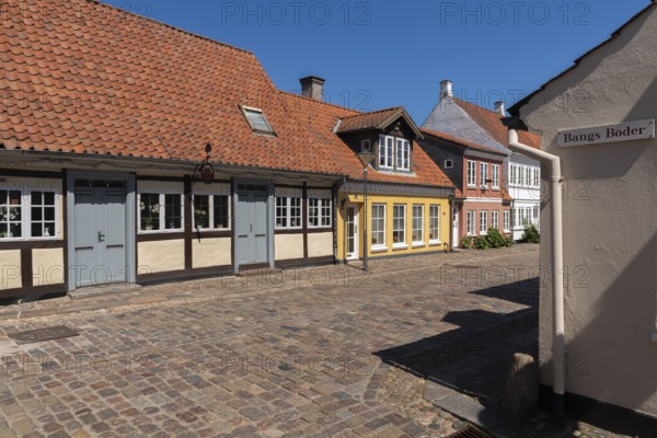 Odense, cobblestone street in the old town, half-timbered house, colourful houses, eaves houses, Fyn, Fyn Island, Denmark, Europe