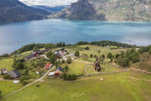 Aerial view of Urnes stave church, Lustrafjord, inner branch of the Sognefjord, Norway, Europe