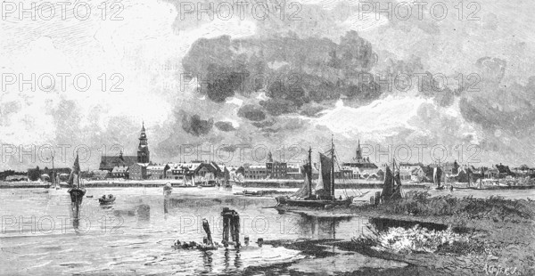 Town view of the border town Sowetsk, Sowjetsk or Tilsit at the Memel, Oblast Kaliningrad, Russia, state border Russia Lithuania, border river, panorama, sailing ship, shore, churches, historical illustration 1880, Europe