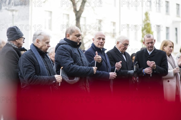 Bogdan Borusewicz (co-founder of Solidarnosc), Kai Wegner (Governing Mayor of Berlin), Frank-Walter Steinmeier (President of the Federal Republic of Germany) and Axel Klausmeier (Director of the Berlin Wall Foundation) light candles at the Berlin Wall Memorial at the central commemorative event at the Berlin Wall Memorial to mark the 35th anniversary of the fall of the Wall in Berlin, 9 November 2024