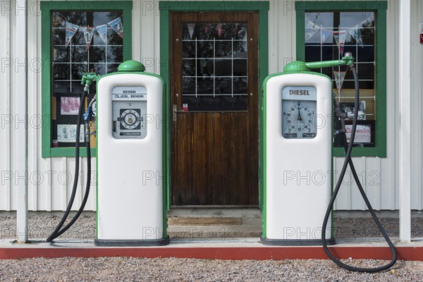 Old historic petrol station with pumps, petrol, oil, combustion, fossil, energy, fuel, environment, climate, climate change, energy transition, crude oil, Co2, car, mobile, mobility, car, drive, diesel, particulate matter, pollutant, historical, history, petrol pump, global warming, fuel, fuel price, Sweden, Europe