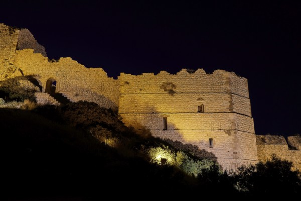 Night shot, A historic castle at night, illuminated and dramatically highlighted against the dark night sky, Kritinia Castle, St John's Castle, Kritinia, Rhodes, Dodecanese, Greek Islands, Greece, Europe