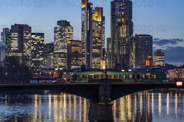 Skyline of the city centre of Frankfurt am Main, river Main, dusk, Ignatz-Bubis-Brücke, Hesse, Germany, Europe