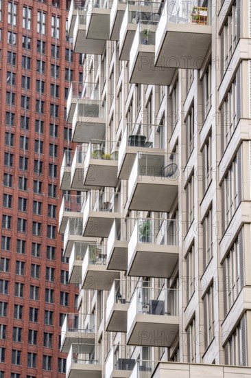 Facades with balconies of high-rise residential buildings, at the Turfmarkt, in the city centre near the central station, Skyline, in the city centre of The Hague, Netherlands