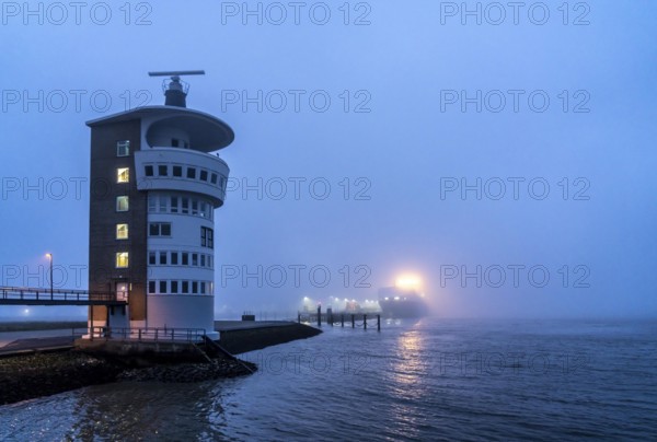 Thick fog in winter, hanging over the mouth of the Elbe into the North Sea, radar tower of the Cuxhaven Waterways and Shipping Office (WSA), radar monitoring of the shipping lanes, shipping traffic in the Elbe estuary, at the Alte Liebe viewpoint, in Cuxhaven, Lower Saxony, Germany, Europe