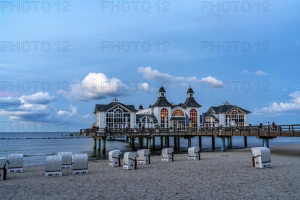 The pier of Sellin, evening mood, sunset, 394 metres long, with restaurant, jetty, beach chairs, island of Rügen, Mecklenburg-Western Pomerania, Germany, Europe