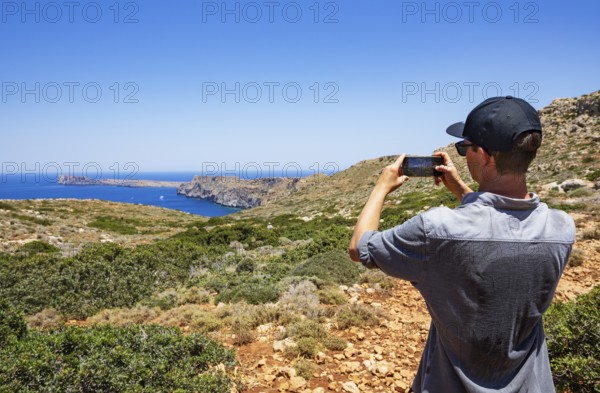 Hikers on the way to the cape of the Gramvousa peninsula, Kolimbari, West Crete, Crete, Greece, Europe