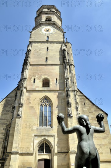 The collegiate church is the oldest Protestant church in Stuttgart and one of the city's landmarks. The female figure on the fountain holds two grape vines in her hands as a gesture of harvest blessing and thanksgiving, Stuttgart, Baden-Württemberg, Germany, Europe