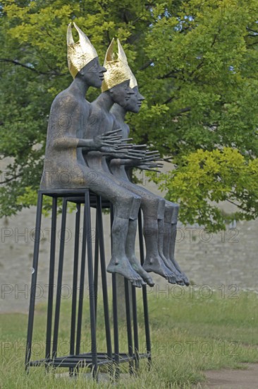 Sculpture Enthroned by Volkmar Kühn 2021, three bishops with golden mitres sitting on stools, row, arms outstretched, frame, mitre, citadel, Petersberg, Erfurt, Thuringia, Germany, Europe