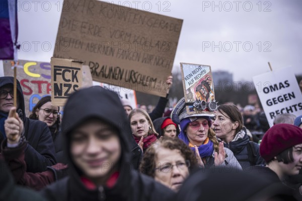 150, 000 people gather around the Bundestag in Berlin to build a human wall against the shift to the right in society. We are the firewall chanted demonstrators from a wide range of social groups. Recordings on 03.02.2024 in Berlin