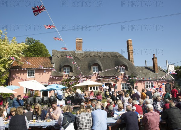 Street party celebrating royal wedding of Prince harry and Meghan Markle, Sorrel Horse Suffolk, England, UK May 19, 2018 Duke and Duchess of Sussex