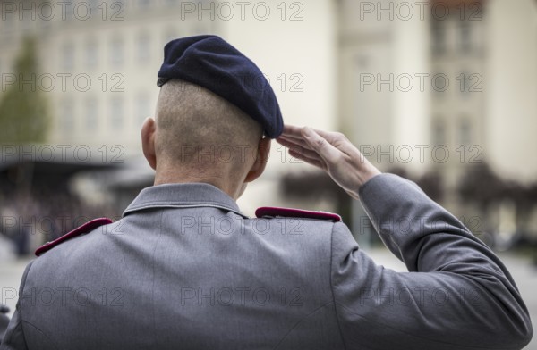 A soldier salutes during the final roll call at the Federal Ministry of Defence to mark the Bundeswehr's deployment in Mali