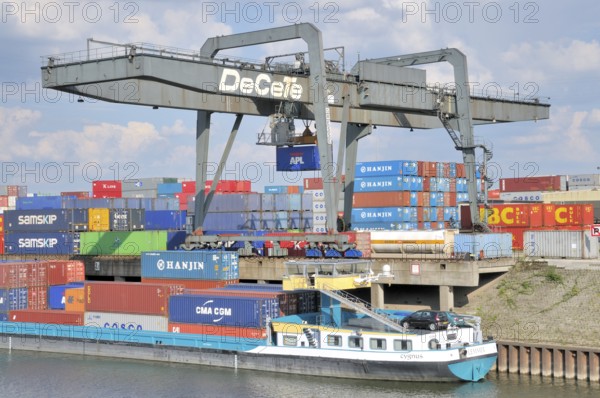 Container ship being loaded, inland harbour in Duisburg, North Rhine-Westphalia, Germany, Europe