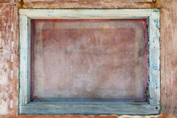 Stone wall with wooden frame as texture, graphic, graphic, texture, background, window, window frame, frame, framed, text field, colour, old, dilapidated, flaked, pale, pastel, design, retro, spatial, element, panel, blank, wall paint, picture, mural, plaster wall, clay plaster, pale, faded, earthy, red, blue, wood, clay, clay building, house wall, building material