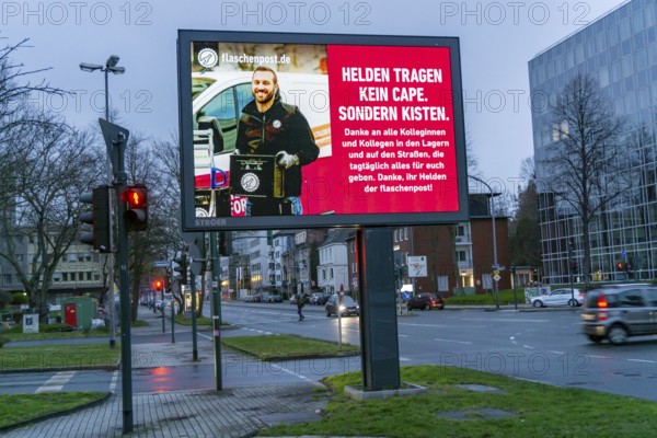 Advertising during the corona epidemic, beverage delivery service Flaschenpost.de, LED roadside screen, digital advertising monitors, effects of the corona crisis in Germany, Essen, at Alfredstraße, B224