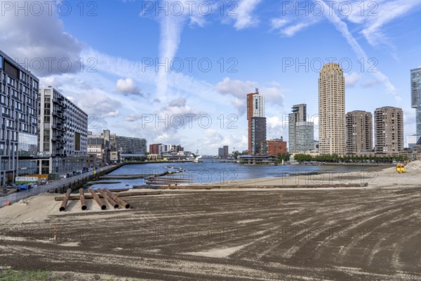 The Rijnhaven, a 28-hectare harbour basin, has now been filled in by almost a third to create space for up to 3, 000 flats, there will be an artificial beach, a floating park connected by jetties, restaurants and shops, cultural facilities, a major urban development project in the old harbour, the Rijnhaven borders on the popular Kop van Zuid and Katendrecht districts, Rotterdam, Netherlands