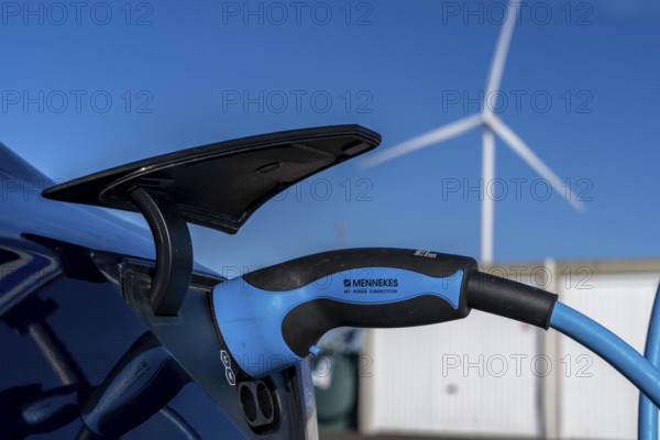 Electric car fast charging station, from the Dutch provider PowerGo, in the ferry harbour of Eemshaven, powered by renewable energy, Netherlands