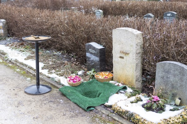 Prepared grave site for an urn burial with sand and flower baskets, urn grave, Riesa cemetery, Saxony, Germany, Europe