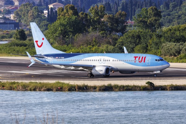 A TUI Boeing 737-800 aircraft with the registration G-TAWA at the airport in Corfu, Greece, Europe