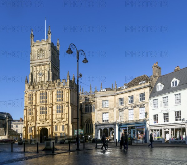 Historic buildings in market place and parish Church of St John Baptist, Cirencester, Gloucestershire, England, UK