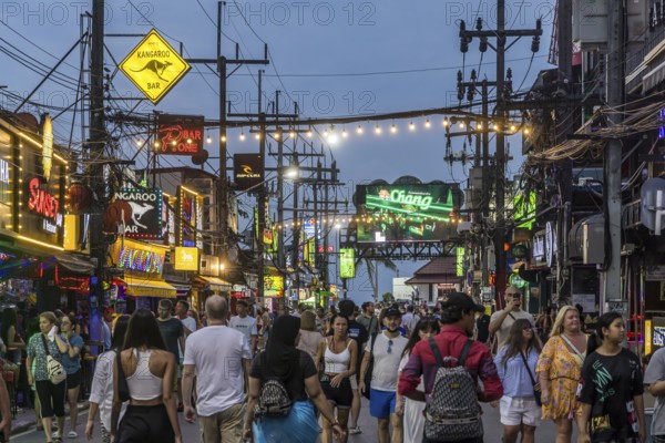 Crowds of people on Bangla Street in the evening. Nightlife on Bangla Walking Street with go-go bars, clubs, cannabis bars and extreme loudness. Patong, Kathu, Phuket Island, Thailand, Asia