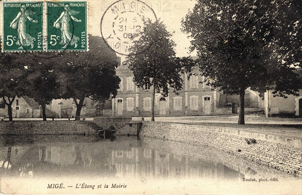 Mige,
Pond and town hall