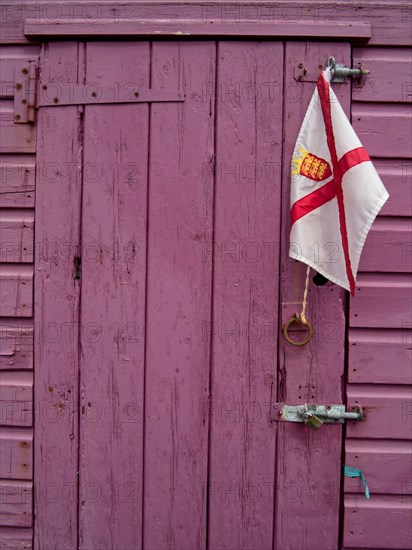 Wooden door with the flag of Jersey