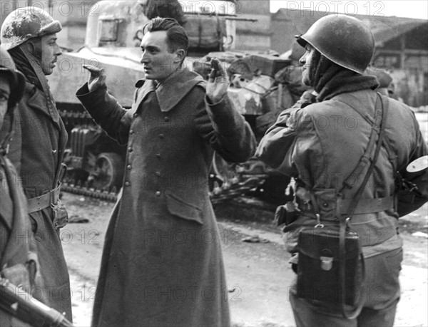 A German sniper captured in Colmar by 1st French Army , February 2, 1945