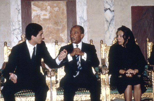 First anniversary of Reza Shah Pahlavi's death. Reza, President Sadat and Farah Pahlavi, 1981