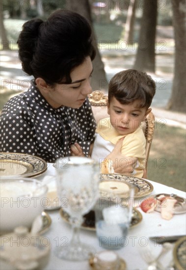 Farah Pahlavi and her son Reza (1961)