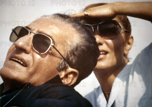 Mohamad Reza Shah and Farah Pahlavi watching the sky during the first flight of their son