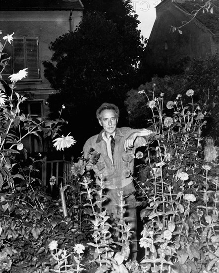Cocteau in his garden of Milly-la-Forêt, South of Paris